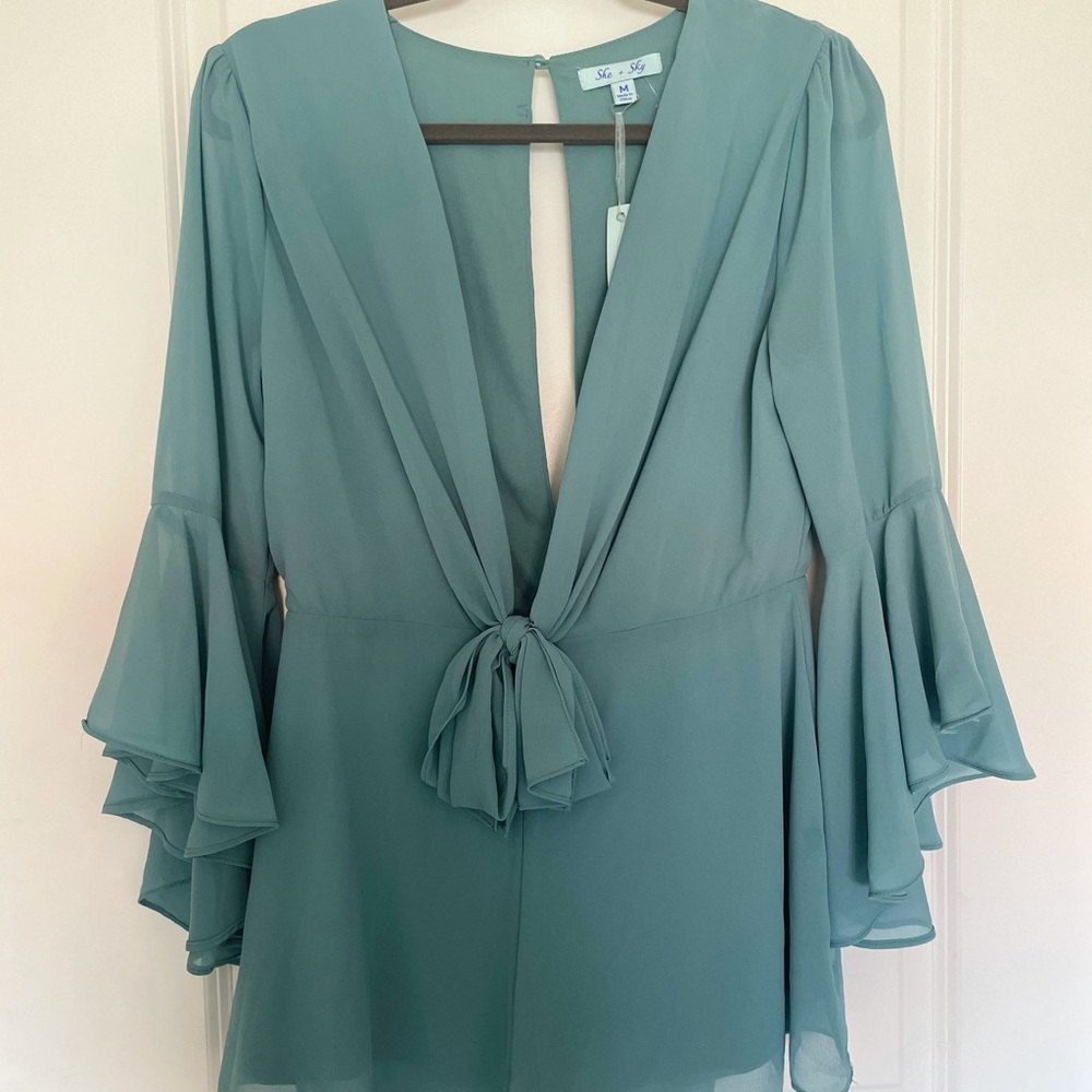 Never used romper that I bought in a boutique!